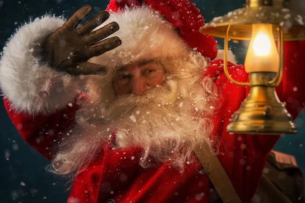 Santa claus drží pytel s dárky — Stock fotografie