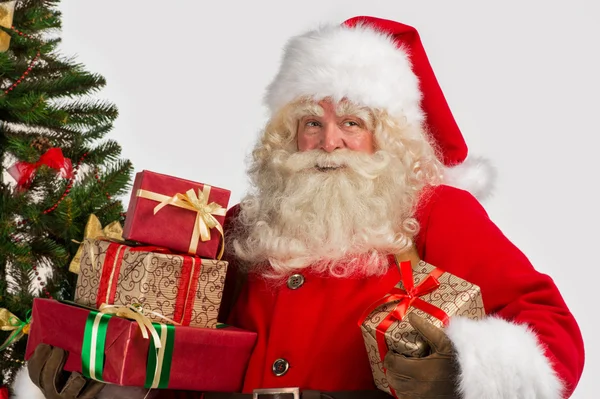 Kerstman met giftboxes — Stockfoto