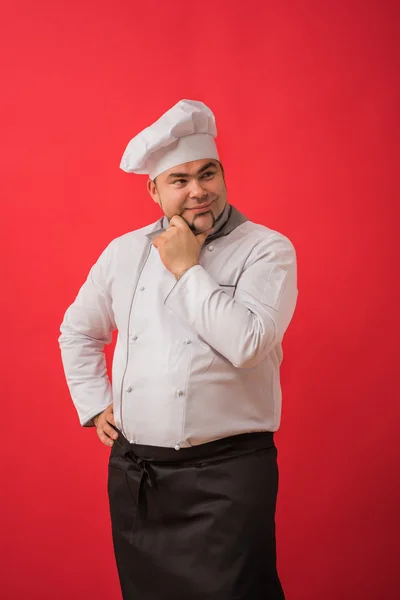 Hombre en uniforme de chef pensando —  Fotos de Stock