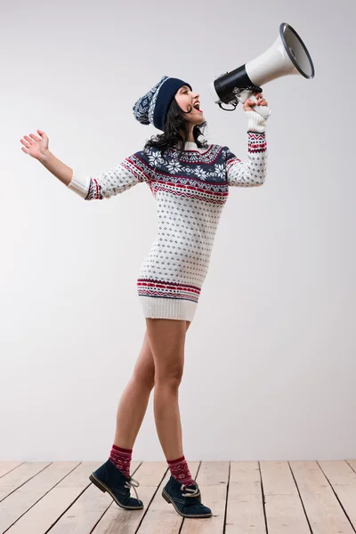 Christmas woman with megaphone — Stock Photo, Image