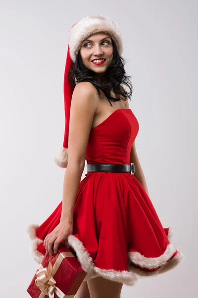 Menina sexy em vestido de Papai Noel — Fotografia de Stock