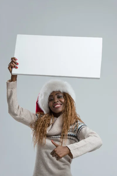 Afrikanische Weihnachtsfrau mit Schild — Stockfoto