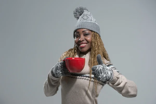 African woman with hot drink — Stock Photo, Image