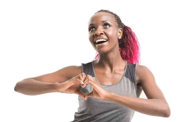 Ragazza mostrando segno di cuore — Foto Stock