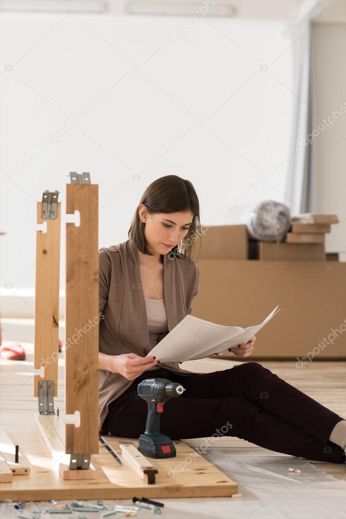 Woman Assembling Furniture