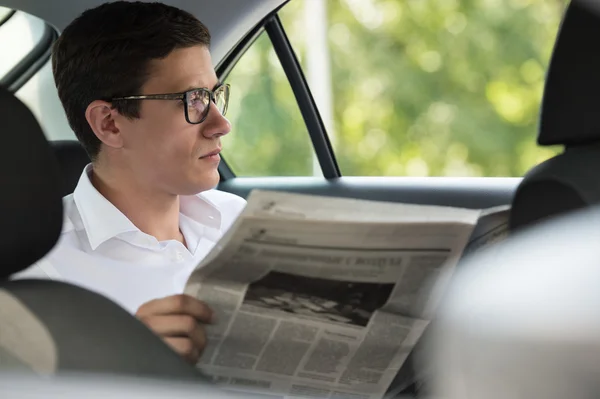 Businessman reading news — Stock Photo, Image
