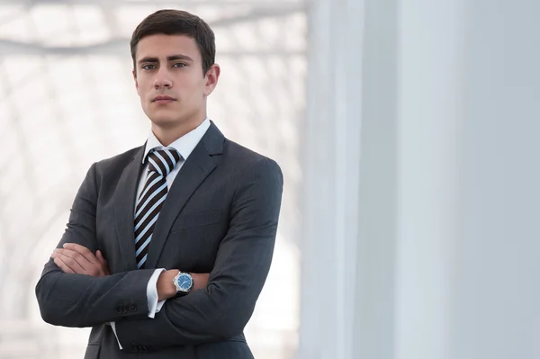 Handsome confident young businessman — Stock Photo, Image