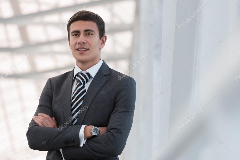 Handsome confident young businessman