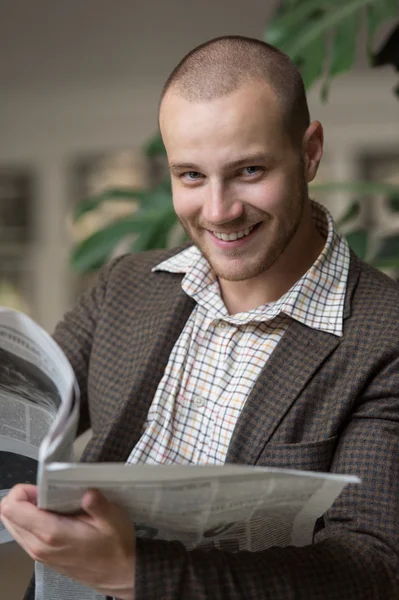 Businessman reading newspaper — Stock Photo, Image