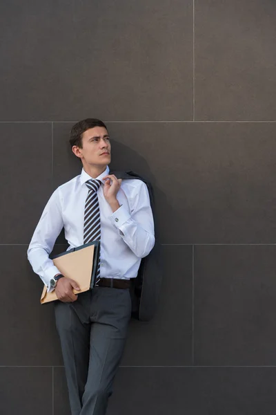 Businessman wearing suit with documents — Stock Photo, Image