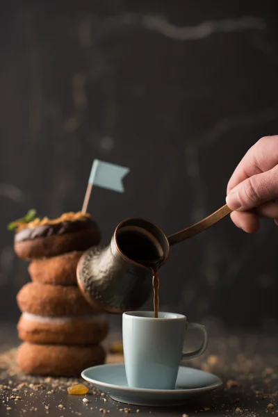 Donuts e xícara de café — Fotografia de Stock