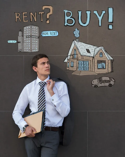 ビジネスマンおよび住宅ローンの概念の記号 — ストック写真