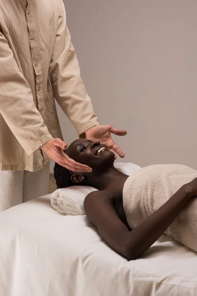 Woman enjoys massage — Stock Photo, Image