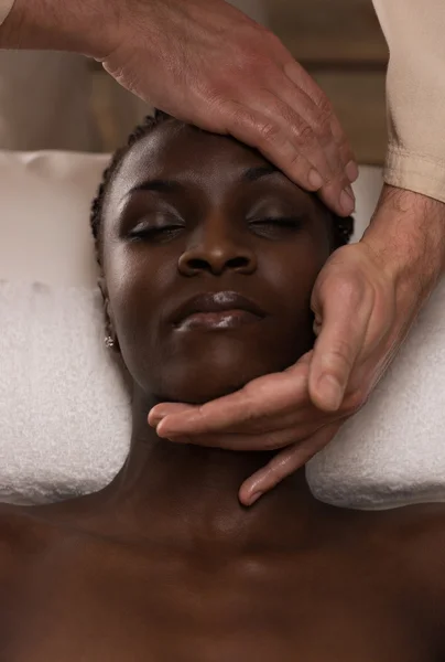 Woman enjoys facial massage — Stock Photo, Image