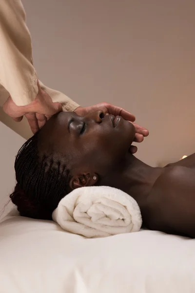Woman enjoys facial massage — Stock Photo, Image