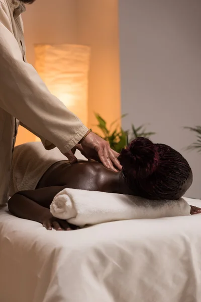 Woman enjoys body back massage — Stock Photo, Image