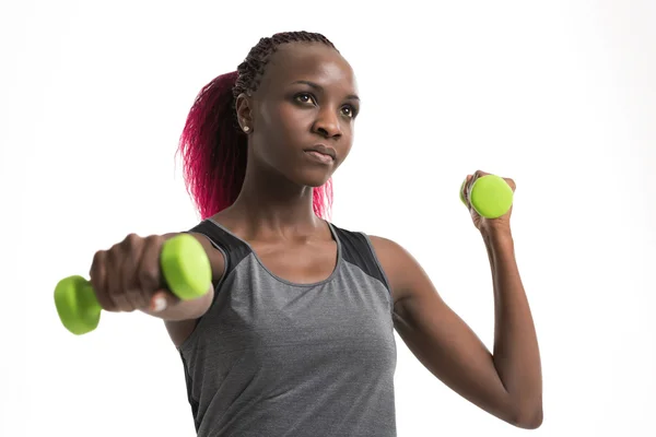 Sporty girl holding weights — Stock Photo, Image