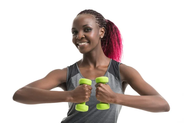 Sporty girl holding weights — Stock Photo, Image