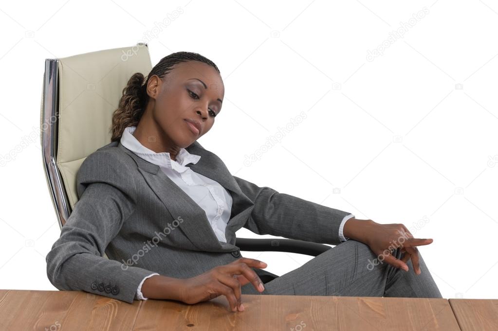 Business woman thinking at desk