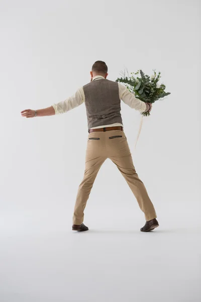 Modern groom portrait with bouquet — Stock Photo, Image
