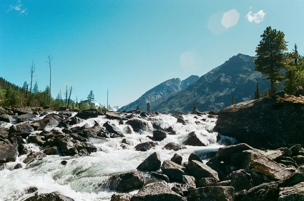 Cascade river in mountains Stock Image