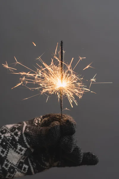 Female hand with Christmas Sparkler — Stock Photo, Image