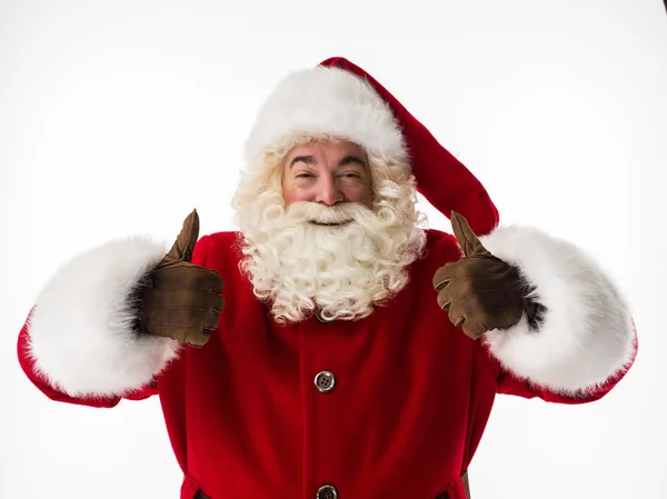 Santa Claus směřují palec nahoru — Stock fotografie