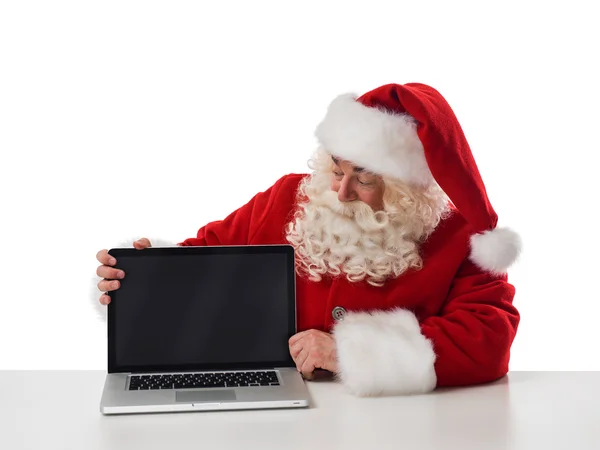 Santa Claus portret met laptop — Stockfoto