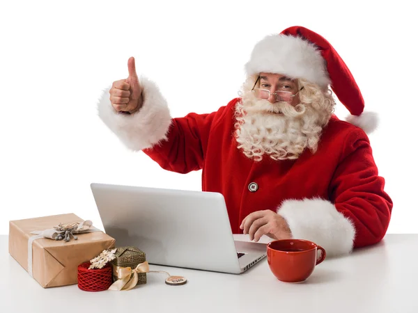 Santa Claus porträtt med laptop — Stockfoto