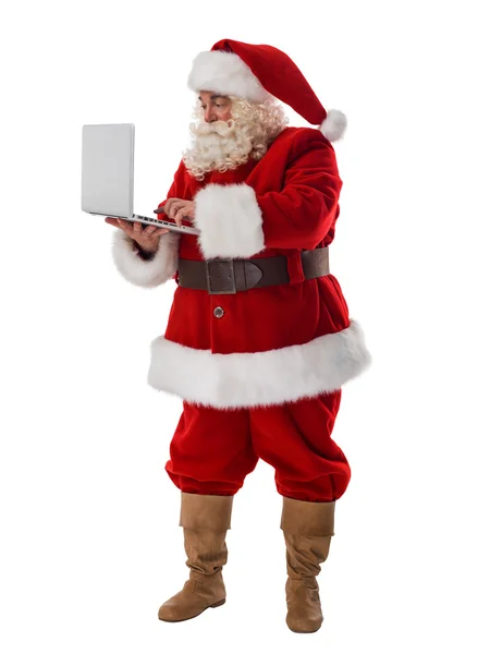 Ritratto di Babbo Natale con laptop — Foto Stock