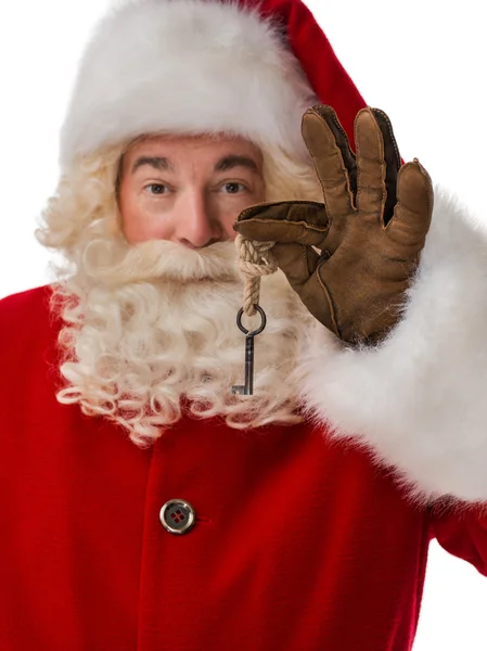 Santa Claus gospodarstwie klucze — Zdjęcie stockowe