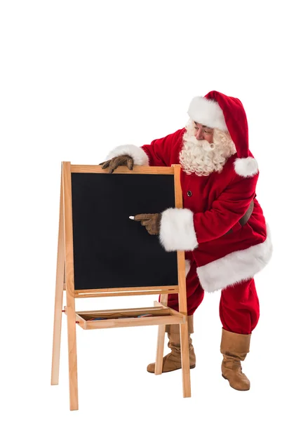 Santa Claus skriva på svarta tavlan — Stockfoto