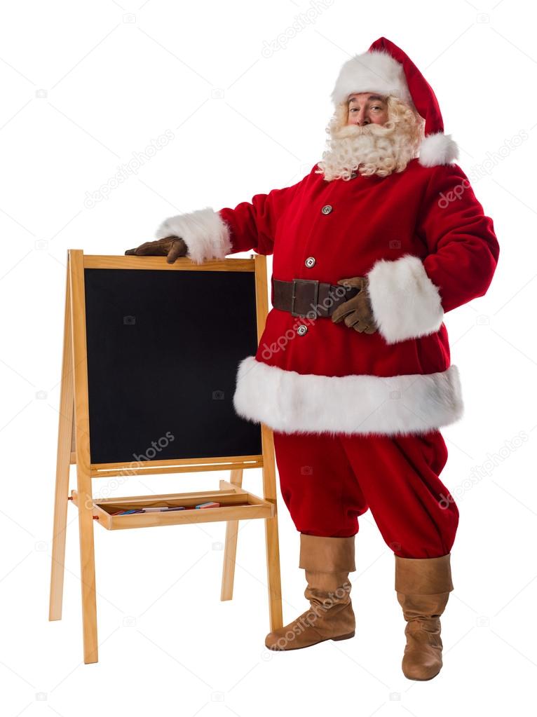 Santa Claus standing near blackboard
