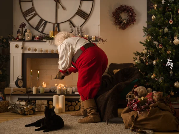 Weihnachtsmann zu Hause — Stockfoto