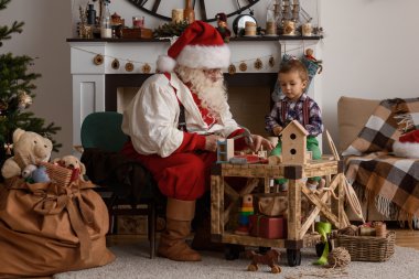Noel Baba ile çocuk