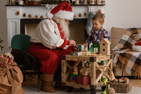 Santa Claus s dítětem — Stock fotografie