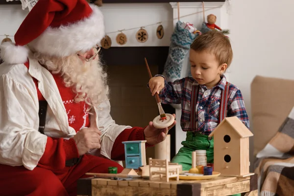 Weihnachtsmann mit Kind — Stockfoto