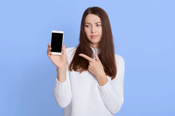 Winsome Displeased Woman Has Long Brown Hair Wears White Sweater — Stock Photo, Image
