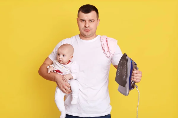Man Father Iron Baby Hands Needs Lots Work Looking Camera — Stock Photo, Image