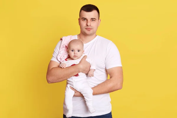 Father Holding Newborn Baby Son Daughter While Posing Isolated Yellow — Stock Photo, Image