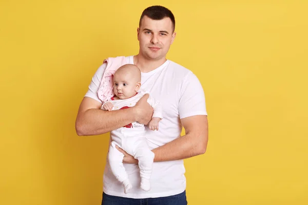 Attractive Father Holding His Newborn Baby Hands Looking Directly Camera — Stock Photo, Image