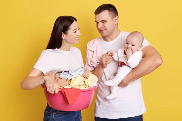 Family Laundry Isolated Yellow Background Dad Holding Little Newborn Daughter — Stock Photo, Image