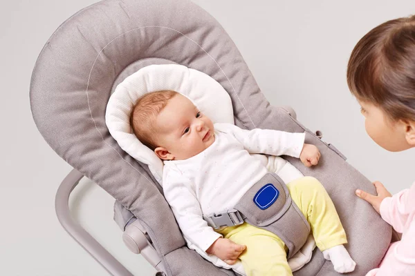Pretty Newborn Child Bouncer Rocking Chair Looking Curious Expression Her — Foto de Stock