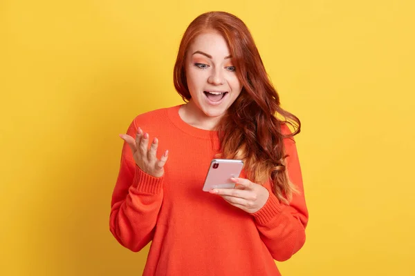 Excited Red Haired Woman Looking Screen Smart Phone Surprised Facial — Stok Foto