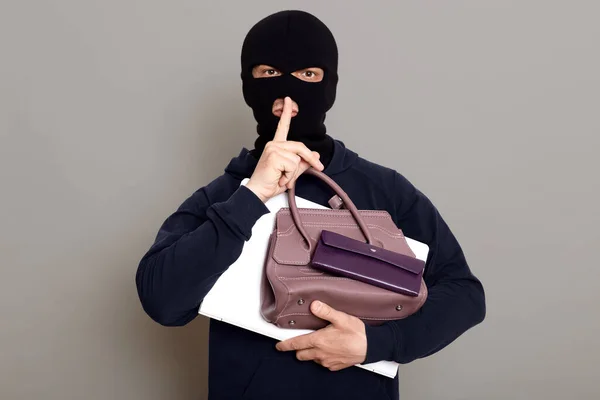 Man Burglar Holds Laptop Wallet Woman Purse His Hands Holds — 图库照片