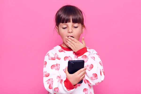 Astonished Female Kid Wearing Casual Jumper Looking Smart Phone Surprised — Stock Photo, Image