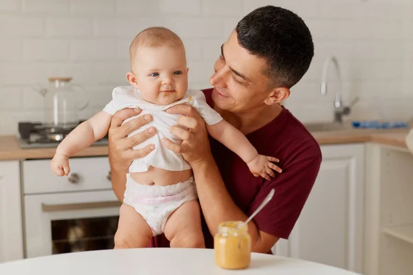 Portrait Happy Father Feeding Cute Baby White Shirt Diaper Sitting — Stock Photo, Image