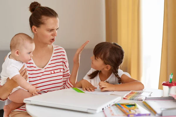 Mother Becoming Frustrated Daughter While Doing Homework Sitting Table Home — Stock Photo, Image