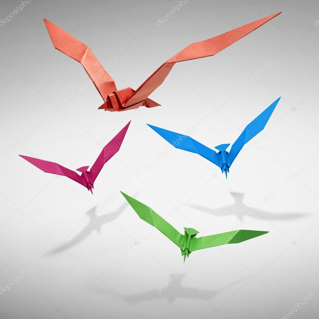 Group of flying birds in Origami