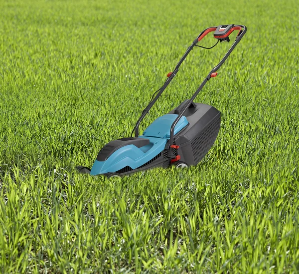 Lawn mower surrounded by high grass. — Stock Photo, Image